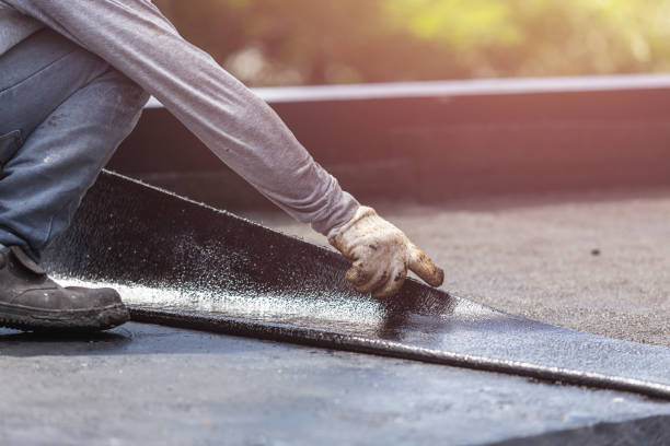 Professional Waterproofing technician working in Harpersville, AL